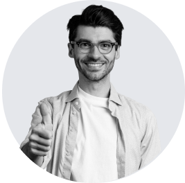 Smiling man giving thumbs up